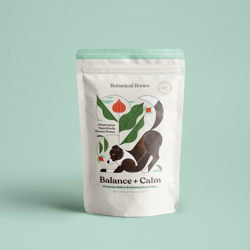 A package of Botanical Bones Balance + Calm supplements for pets, with an illustration of a dog on the front.