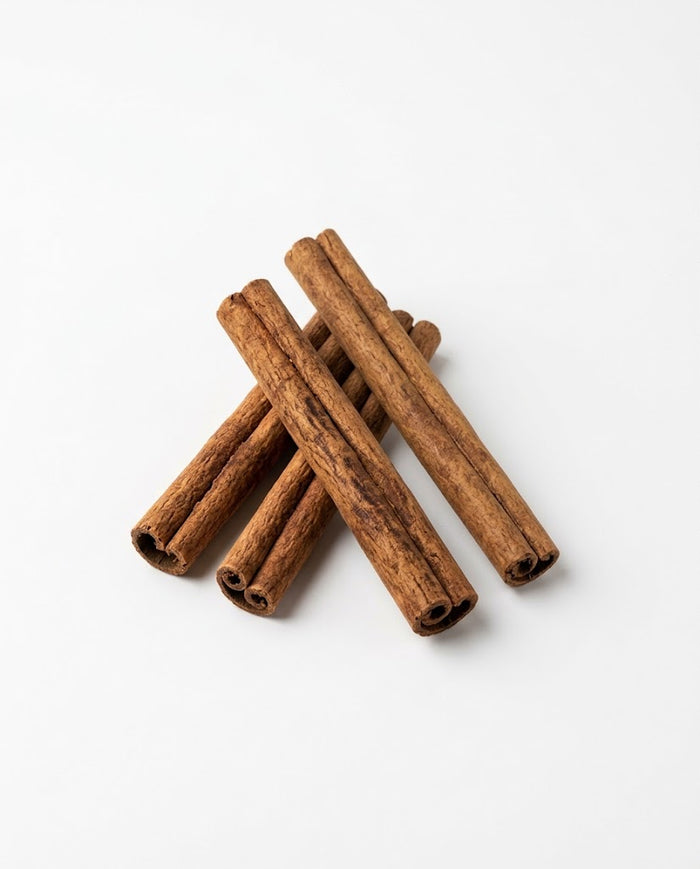 Cinnamon sticks on white background
